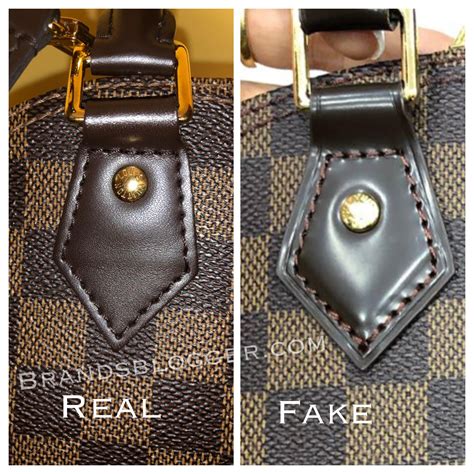 louis vuitton alma original vs fake|false louis vuitton handbags.